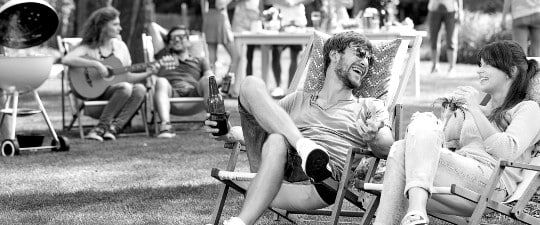 two people in lawn chairs 540x225