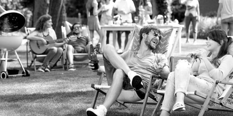 laughing couple in lawn chairs 2X1