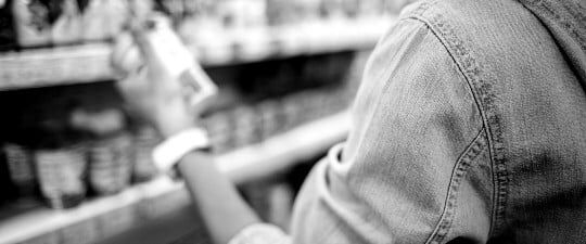 arm in a shopping center with shelves
